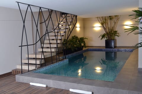 Indoor pool, open 9:00 AM to 9:00 PM, sun loungers
