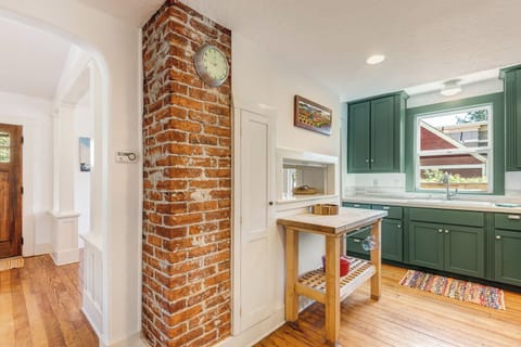 Kitchen is in center of home with open access to dining and living rooms