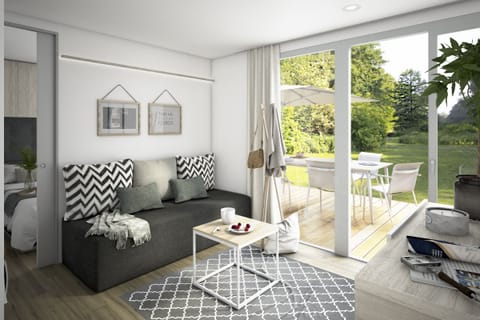Deluxe Cabin, 2 Bedrooms | Living area | TV