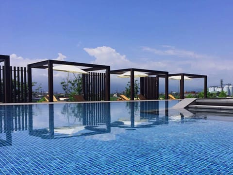 Seasonal outdoor pool, pool umbrellas, sun loungers