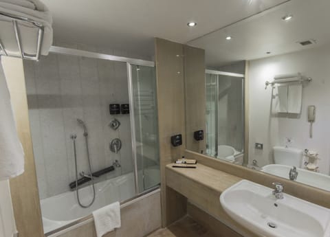 Superior Double Room | Bathroom | Deep soaking tub, designer toiletries, hair dryer, bathrobes