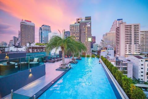 Outdoor pool, pool umbrellas, sun loungers