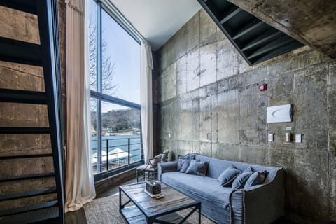 Deluxe Loft, Non Smoking, River View (SS VI) | Living area | Flat-screen TV, pay movies