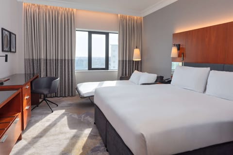 Family Room | Premium bedding, in-room safe, desk, iron/ironing board