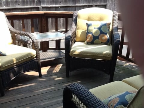 Deck off of kitchen with comfortable seating.  Gas BBQ provided for grilling.