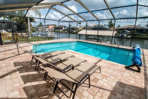 Sit Back and relax by the heated pool