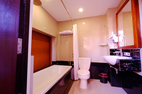 Separate tub and shower, free toiletries, slippers, towels