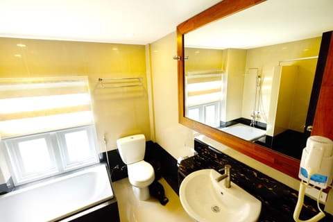 Separate tub and shower, free toiletries, slippers, towels