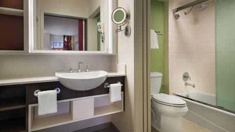 Combined shower/tub, hair dryer, towels, soap