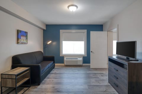 Suite, 1 King Bed, Non Smoking (Living Room) | Premium bedding, desk, blackout drapes, free WiFi