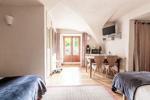 Family Quadruple Room | Down comforters, individually decorated, individually furnished, desk