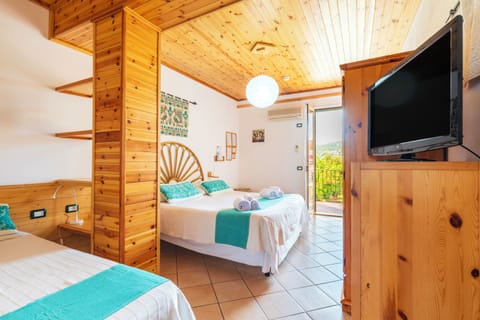 Apartment, 1 Bedroom, Sea View (3 people) | Minibar, in-room safe, individually decorated, individually furnished