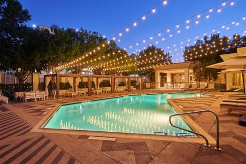 Outdoor pool, open 7:00 AM to 10:30 PM, sun loungers