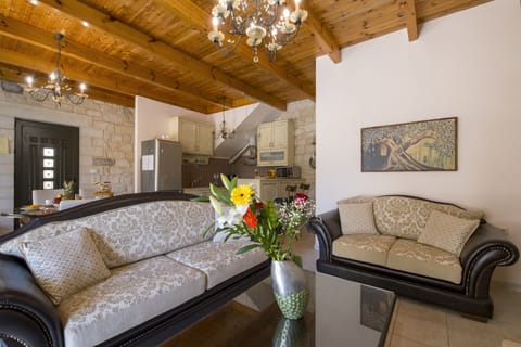 Superior Villa, 2 Bedrooms, Private Pool (Christy) | Living area | 42-inch flat-screen TV with satellite channels, Smart TV, fireplace