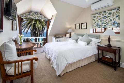Standard Double Room, Ocean View | Minibar, in-room safe, soundproofing, iron/ironing board