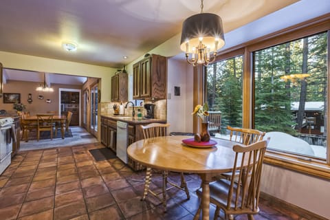 Kitchen table overlooking the back yard. 