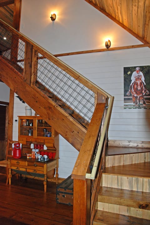 Staircase leading to the master bedroom and bathroom.