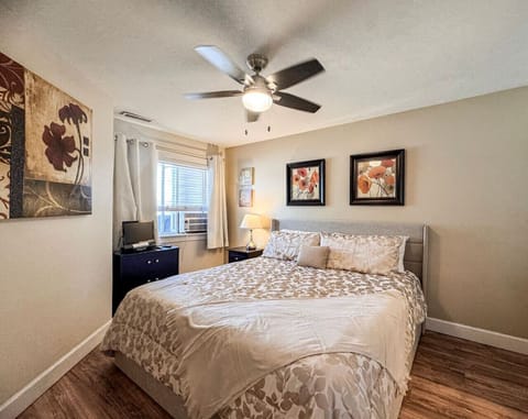 Charming bedroom retreat with plush bedding, soft lighting, and calming decor for restful nights