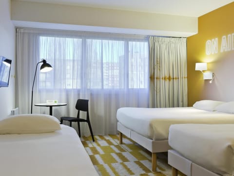 Desk, blackout drapes, soundproofing, free WiFi