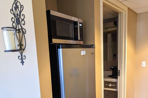 Desk, blackout drapes, iron/ironing board, free cribs/infant beds