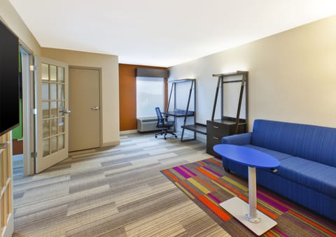 Suite, 1 King Bed | In-room safe, desk, iron/ironing board, free cribs/infant beds