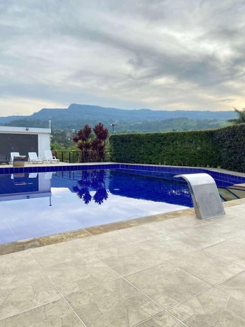 Outdoor pool, open 10:00 AM to 5:00 PM, pool umbrellas, sun loungers