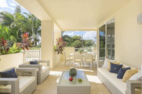 Outdoor Lounge and dining area with private gate to pool