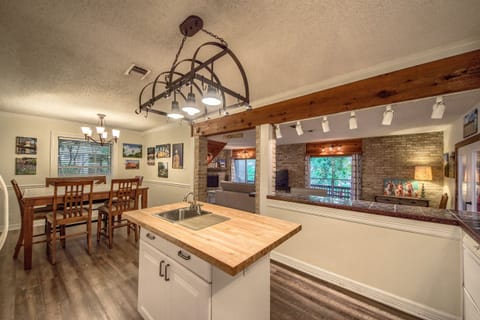 Spacious fully stocked kitchen with island.