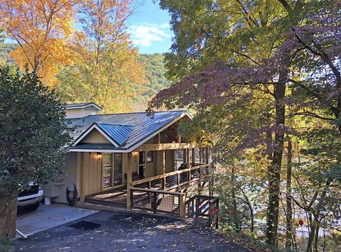 Easy access to Main Level of the house from driveway and covered carport.  Kitchen, Dining, Familly Room, Master Bedroom and another Queen Bedroom are all on the Main level.  Driveway plus gravel parking area easily accommodates 4 vehicles.