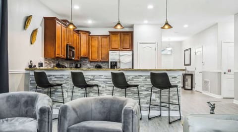 Spacious chef's kitchen, fully equipped with everything needed for culinary endeavors and delightful meals