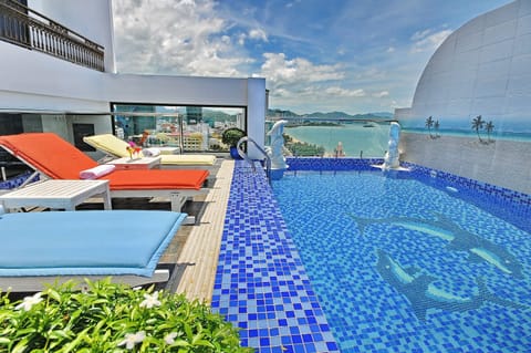 Outdoor pool, open 6:00 AM to 10:00 PM, sun loungers