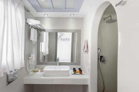 Shower, free toiletries, hair dryer, slippers