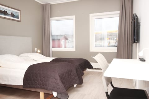 Pillowtop beds, desk, blackout drapes, soundproofing