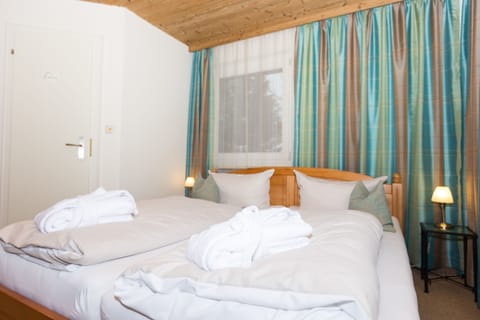 Family Room, 2 Bedrooms, Balcony | Cribs/infant beds, free WiFi, bed sheets