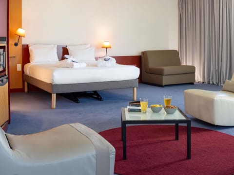 Executive Suite, Multiple Beds | Minibar, in-room safe, desk, laptop workspace