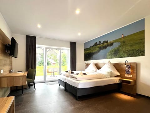 Deluxe Double Room, 1 Bedroom, Mobility Accessible, Patio | Hypo-allergenic bedding, desk, laptop workspace, free WiFi