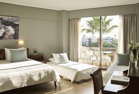 Family Room, Balcony, Partial Sea View | In-room safe, desk, soundproofing, free WiFi