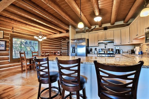 2nd Floor: Kitchen with Breakfast Bar with Seating and Serving for 3