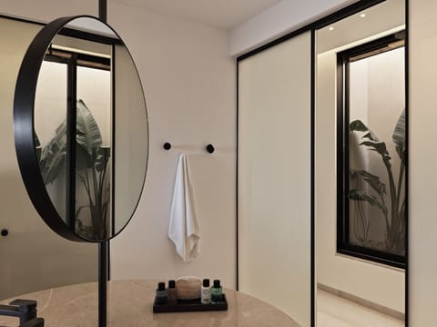 Hideaway Pool Villa | Bathroom | Rainfall showerhead, designer toiletries, hair dryer, bathrobes