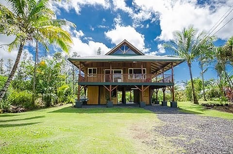 Ohia log cabin home