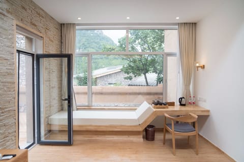 Double Room with Courtyard | Living area | TV