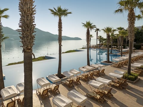 Indoor pool, 2 outdoor pools, sun loungers, lifeguards on site