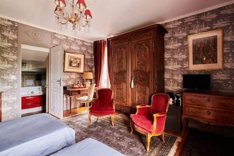 Comfort Twin Room, Garden View | Minibar, individually decorated, individually furnished, desk