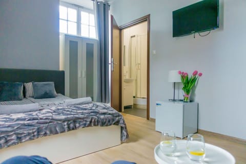 Quadruple Room, Private Bathroom | Iron/ironing board, free WiFi, bed sheets