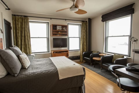 So much natural light in this studio apartment !! (but you have blackout shades)