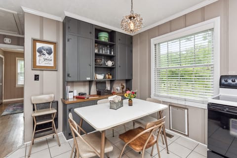 Dining area. Set with 4 chairs, additional in back BR closet.