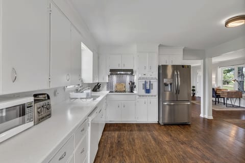 The kitchen is big, bright, and open to the dining room.  Tons of counter space.