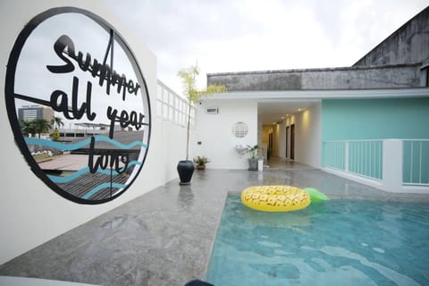 Outdoor pool, a rooftop pool, open 7 AM to 10 PM, sun loungers