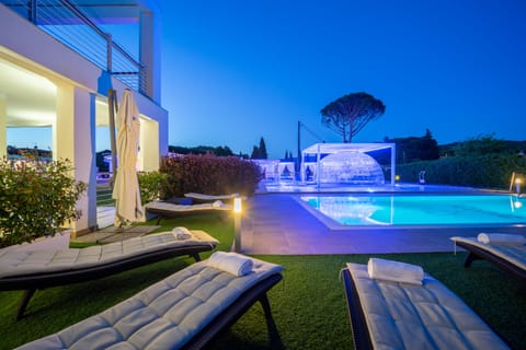 Seasonal outdoor pool, open 9:00 AM to 6:00 PM, sun loungers