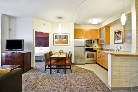 Desk, laptop workspace, blackout drapes, iron/ironing board